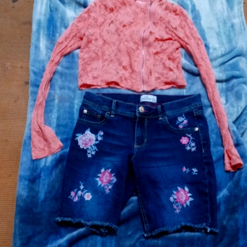 A outfit with shorts and jacket